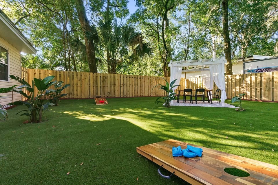 Cornhole, putting green and outdoor seating