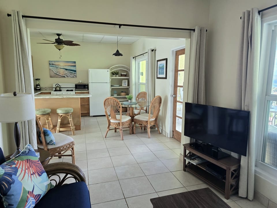 Open floor plan  - curtains can be drawn to divide off living room for additional guests