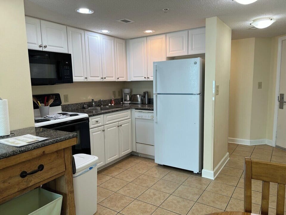Full size Stove, Refrigerator, Microwave and Dishwasher