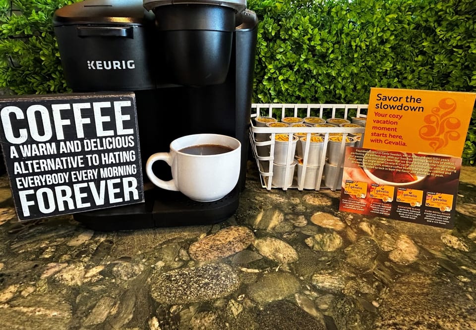 PSA: Your first vacation coffee should never be sad. We’ve all been there—you wake up, stumble to the kitchen… and the host stocked the cheapest off-brand pod known to mankind. Tragic.