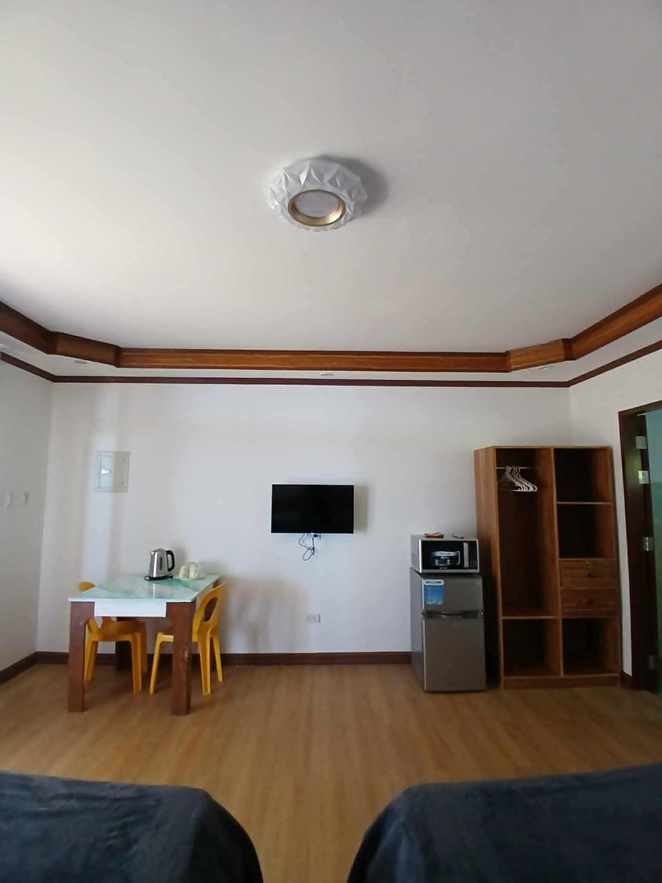 Mini-fridge, microwave, electric kettle, dining tables