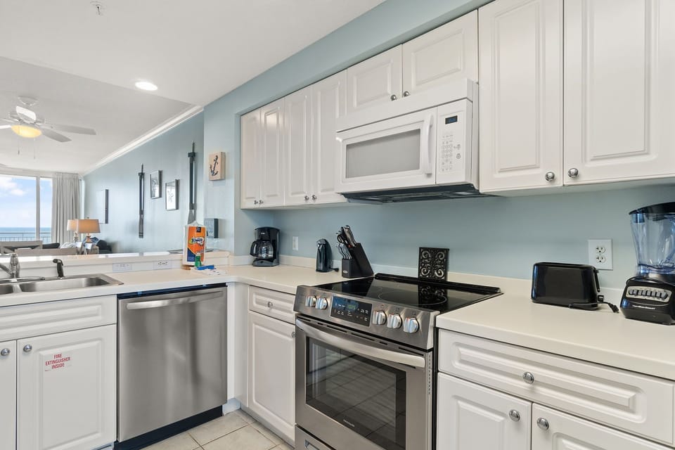 Spacious Kitchen includes all amenities to prepare and enjoy meals together. 