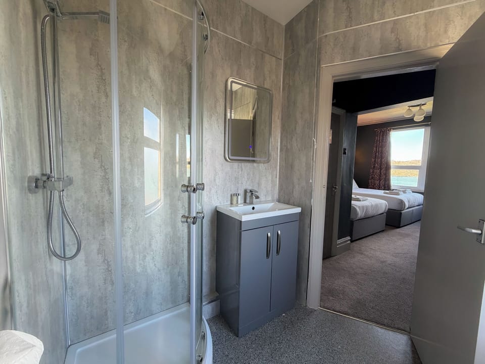 Family Room (2ad+1ch) | Bathroom | Shower, free toiletries, hair dryer, towels