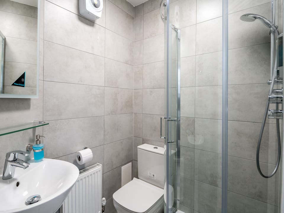 Shower, rainfall showerhead, towels