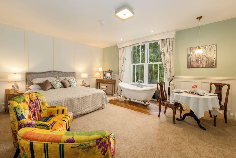 Deluxe Room, Garden View | Premium bedding, in-room safe, individually furnished, laptop workspace