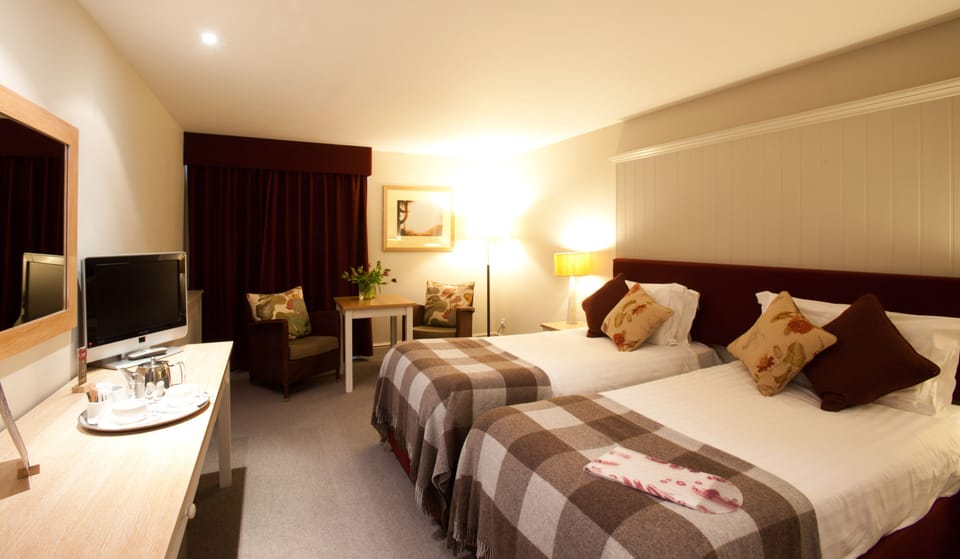 Premium bedding, pillowtop beds, desk, iron/ironing board