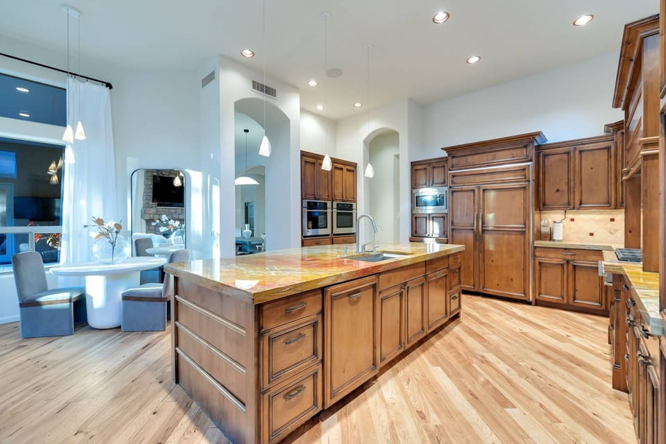 Spacious Kitchen with microwave, gas stove/ovens, fridge, dishwasher, utensils etc