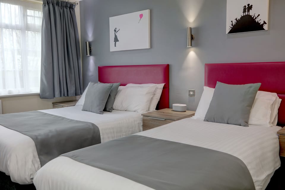 Family Room, Multiple Beds, Non Smoking | Hypo-allergenic bedding, individually decorated, desk, laptop workspace