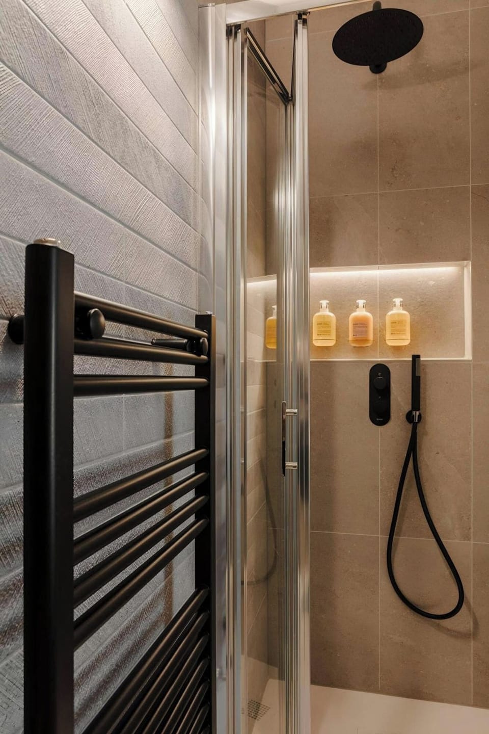 Shower, rainfall showerhead, designer toiletries, hair dryer