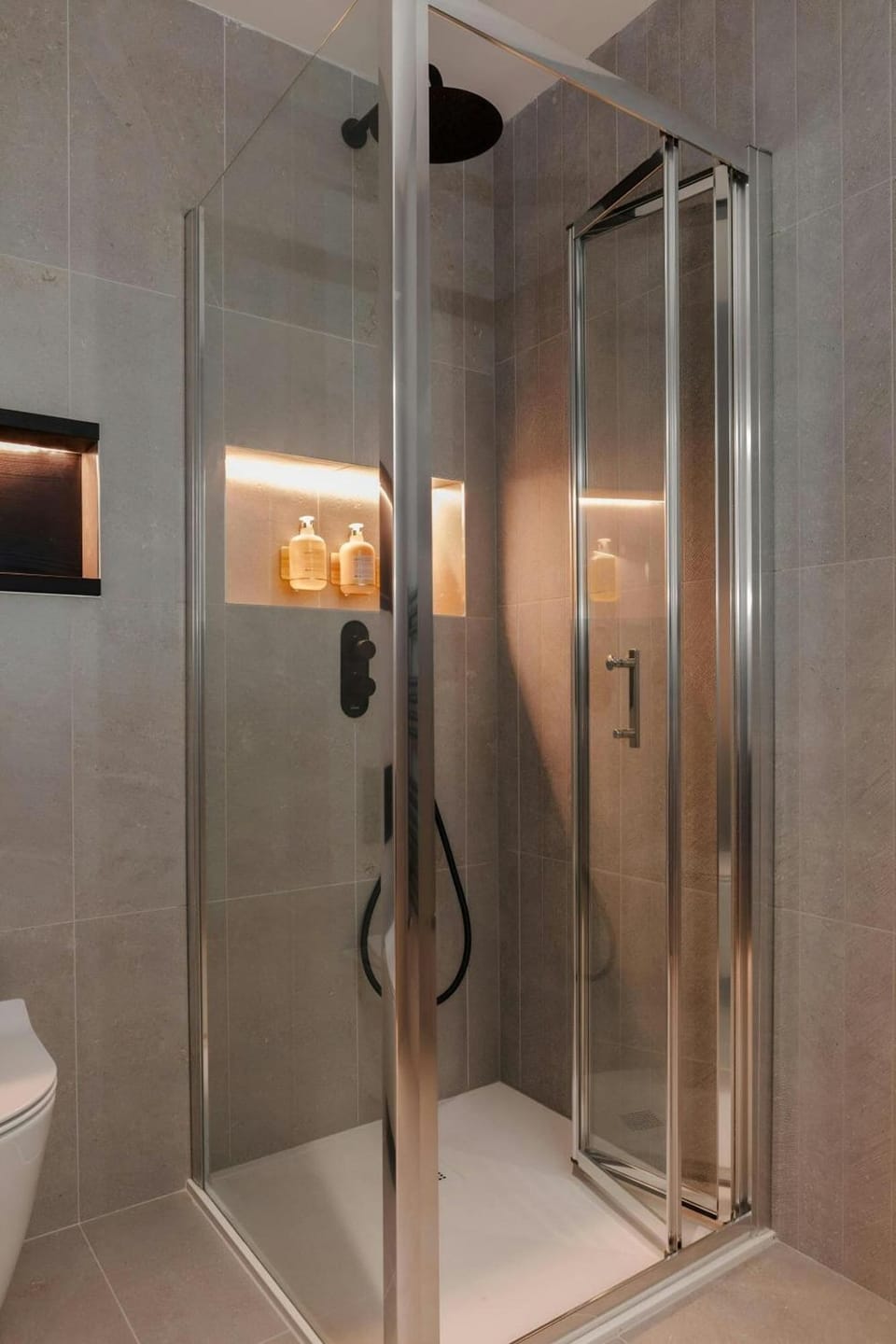 Shower, rainfall showerhead, designer toiletries, hair dryer