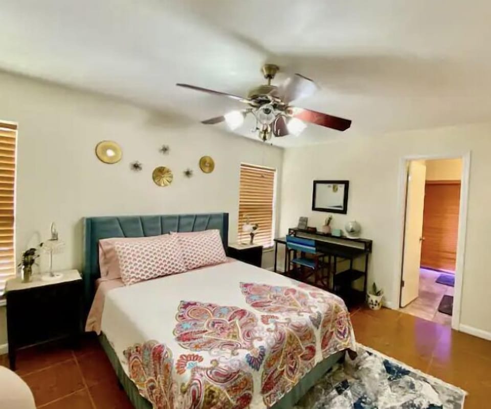 Master’s bedroom with walk in closet and walk in shower.