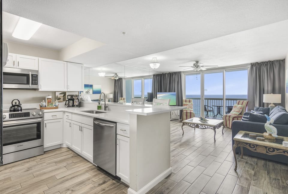 Living room, kitchen to balcony