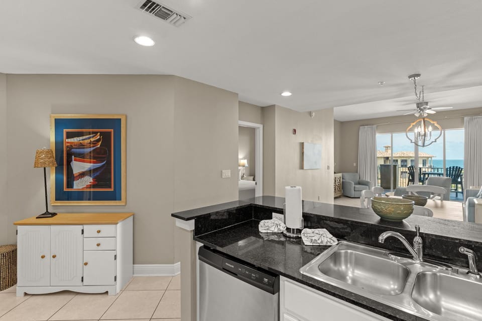 This bright, open-concept space seamlessly connects your kitchen and living area.