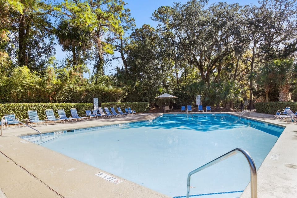 The pool is open year-round with a gate code provided. 