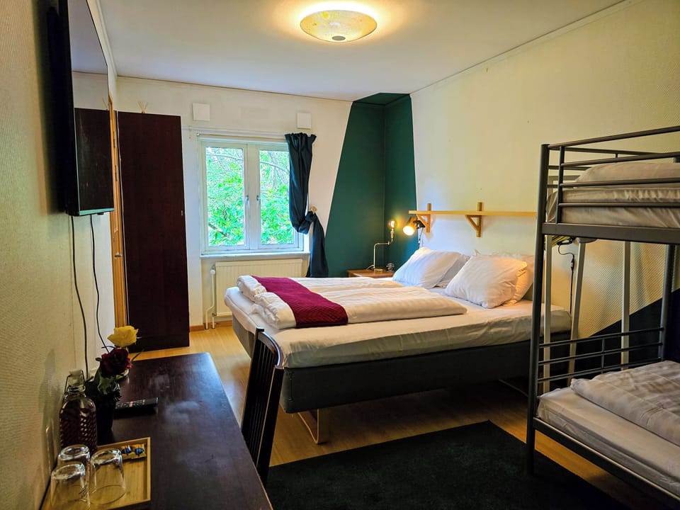 Family Quadruple Room | Memory foam beds, desk, laptop workspace, soundproofing