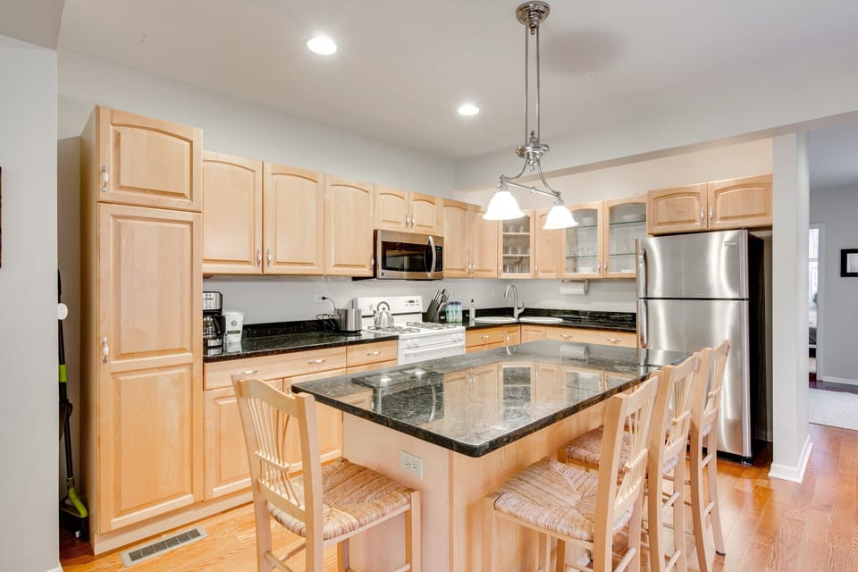 The kitchen island provides a perfect dining space