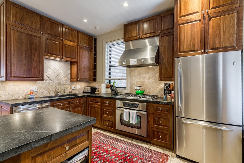 Our kitchen has so much counter space! I just love the tiled backsplash.