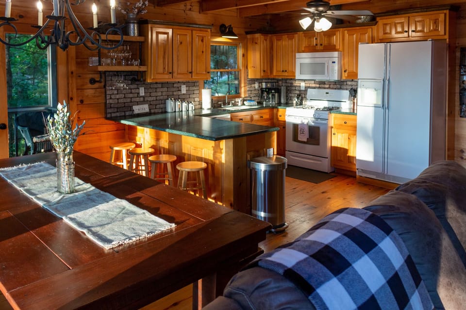 Open concept dining room connected to the kitchen with seating for everyone!
