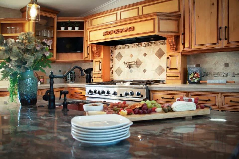 Chefs Kitchen complete with pot filler, ice maker, sub zeros, wolf range, double oven and warming drawer