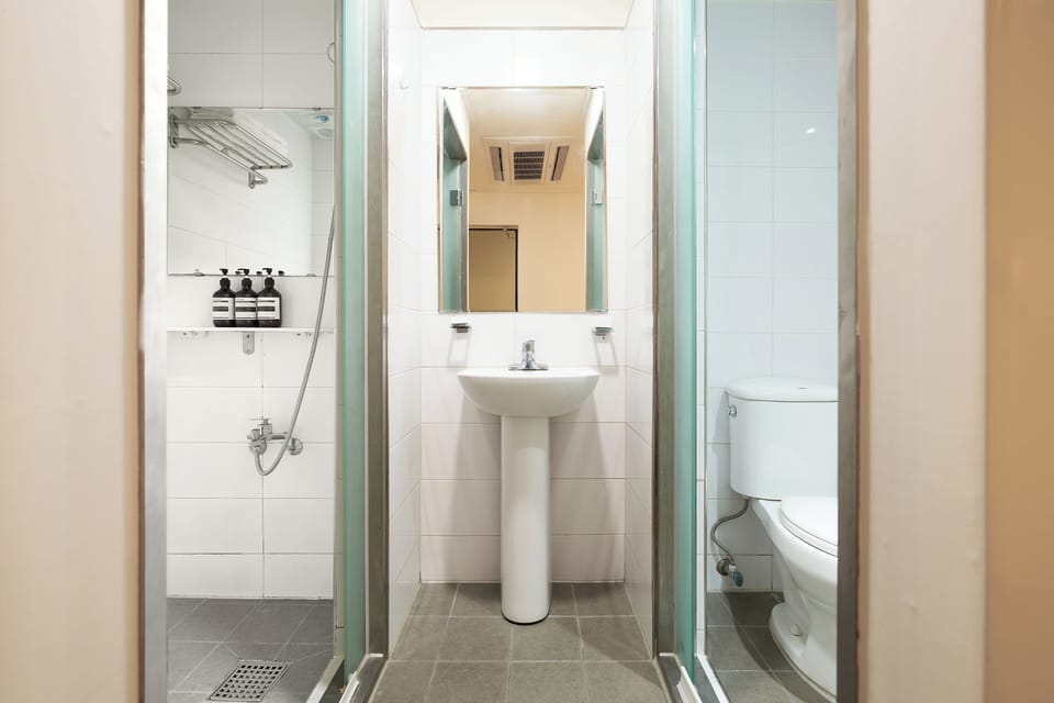 Family Room, 2 Double Bunk Beds, Non-Smoking | Bathroom | Shower, slippers, towels