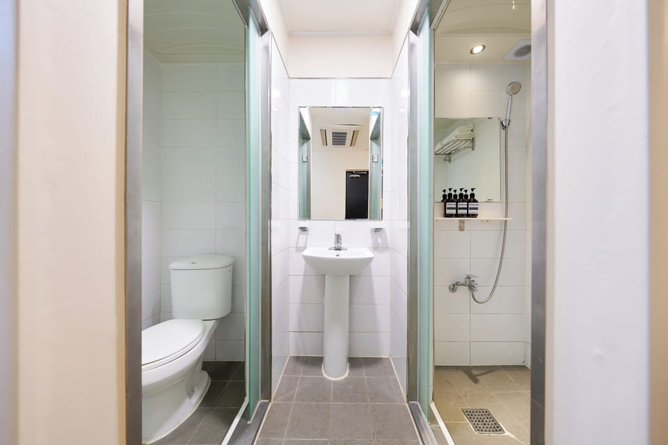 Family Room, 2 Double Bunk Beds, Non-Smoking | Bathroom | Shower, slippers, towels