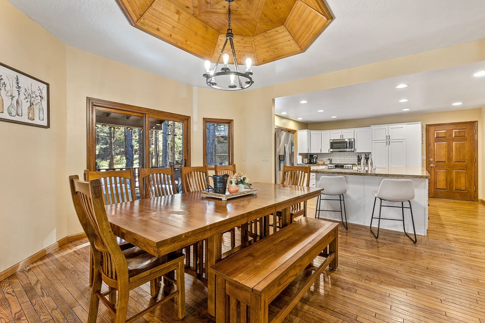 Dining table comfortably seats 10 with more seating at the counter