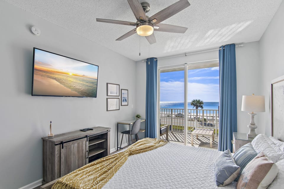 Primary bedroom - all new furniture, King bed, Smart TV, desk and chair, and best of all, GULF VIEWS!