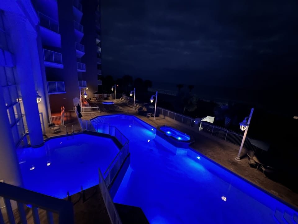 Super cool night time view of the Majestic Sun Pool