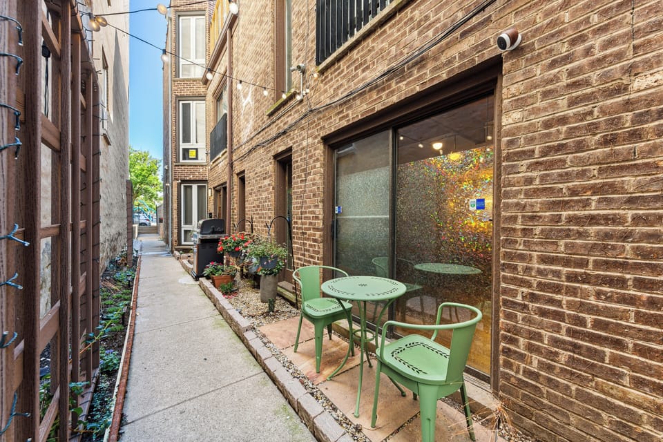 2nd outdoor space with grill and bistro set.