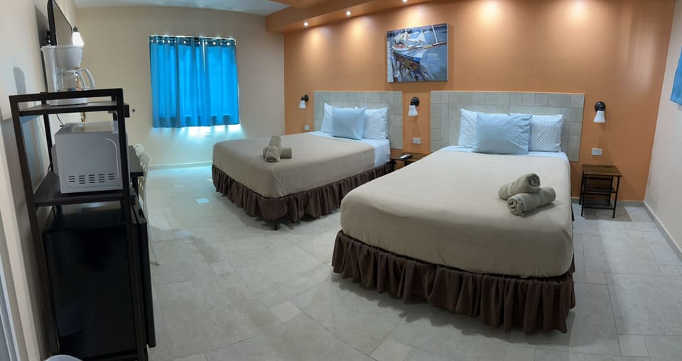 Basic Room, 2 Queen Beds | Desk, free WiFi, bed sheets