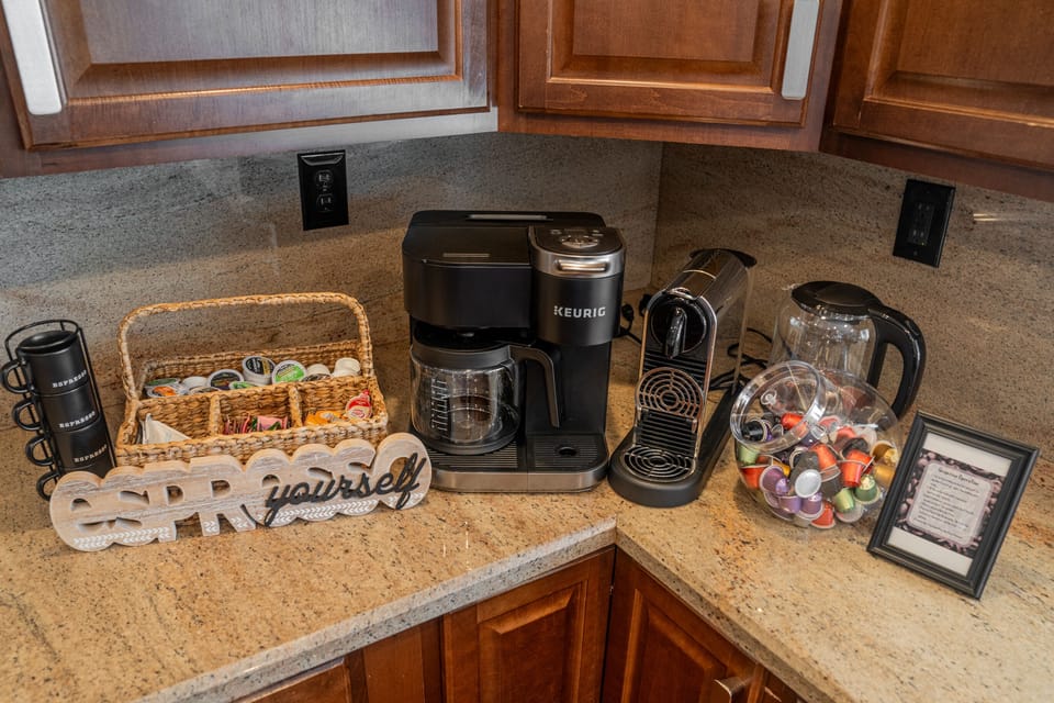 Tea, coffee, espresso, creamer, and sugar provided.