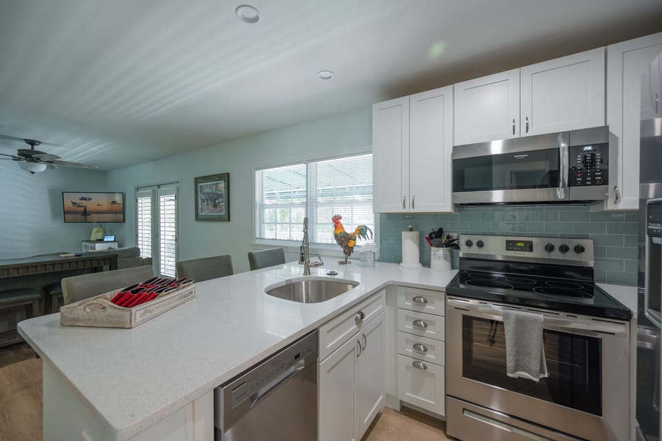 Kitchen with all stainless steel appliances.
