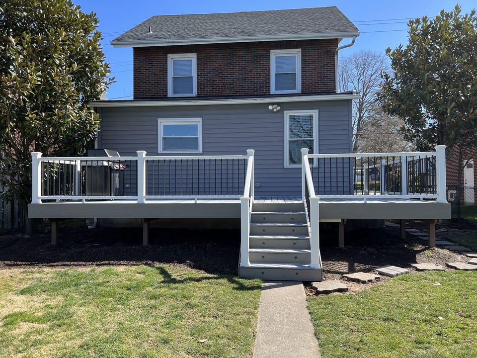New trex deck in the back with a Weber Grill.  Deck furniture this week.