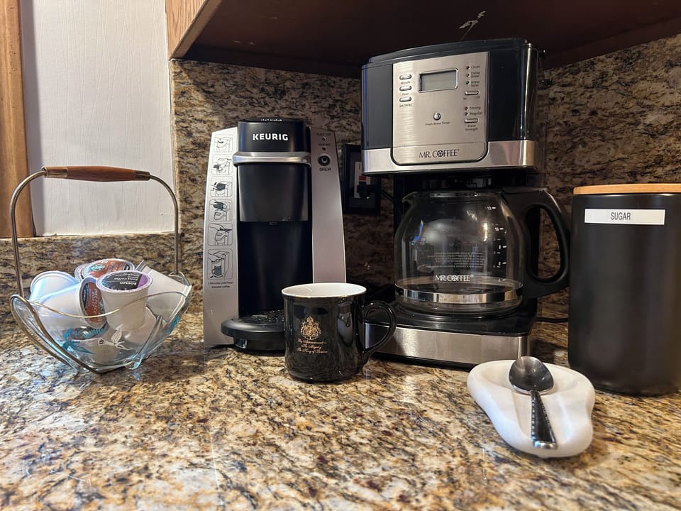 Ready for whatever coffee you prefer. There is a french press in the cabinet too