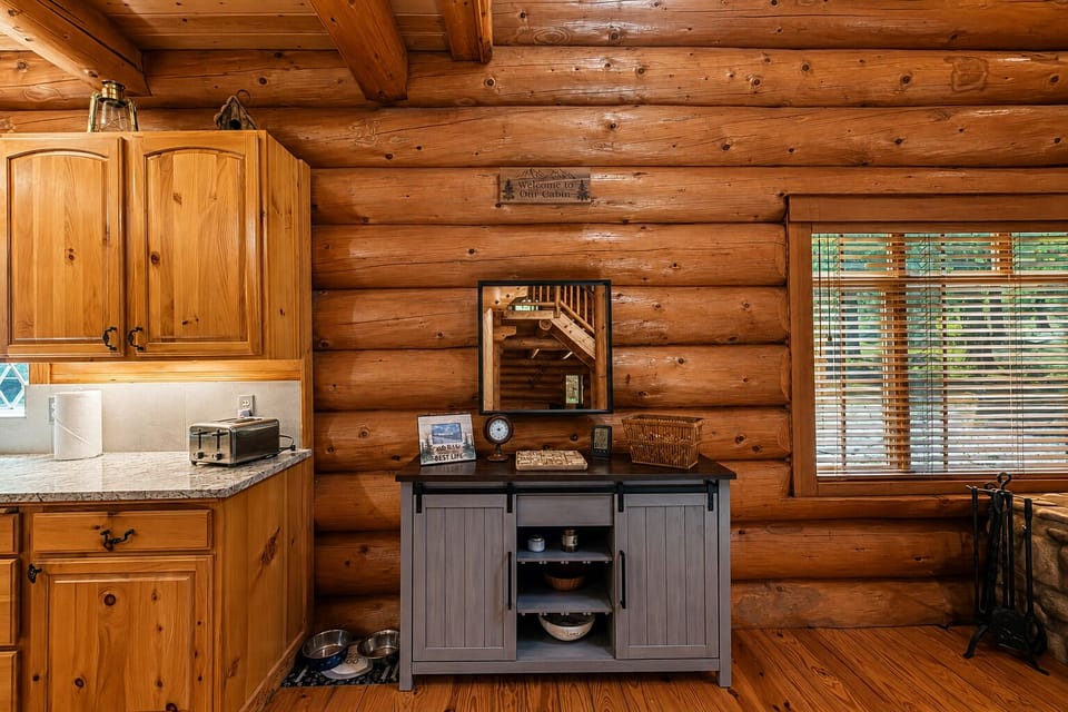 Open Concept living area offers a woodstove for those crisp autumn morning or magical winter nights