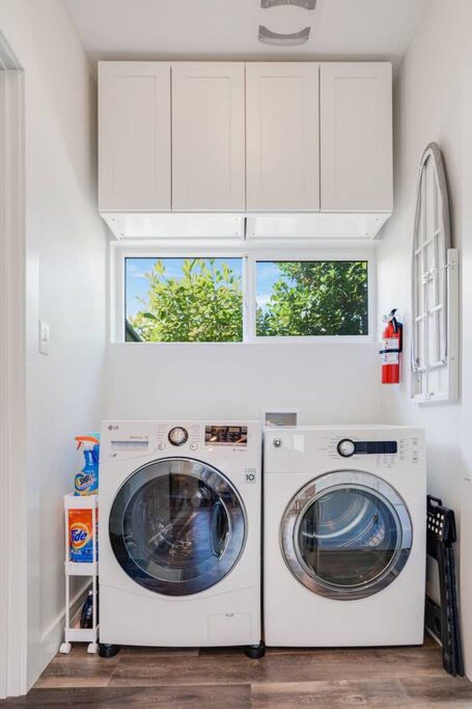 Washer, dryer, laundry detergent, iron, and ironing board for guest use.  Extra linens are available and located in the cupboards above the washer and dryer.