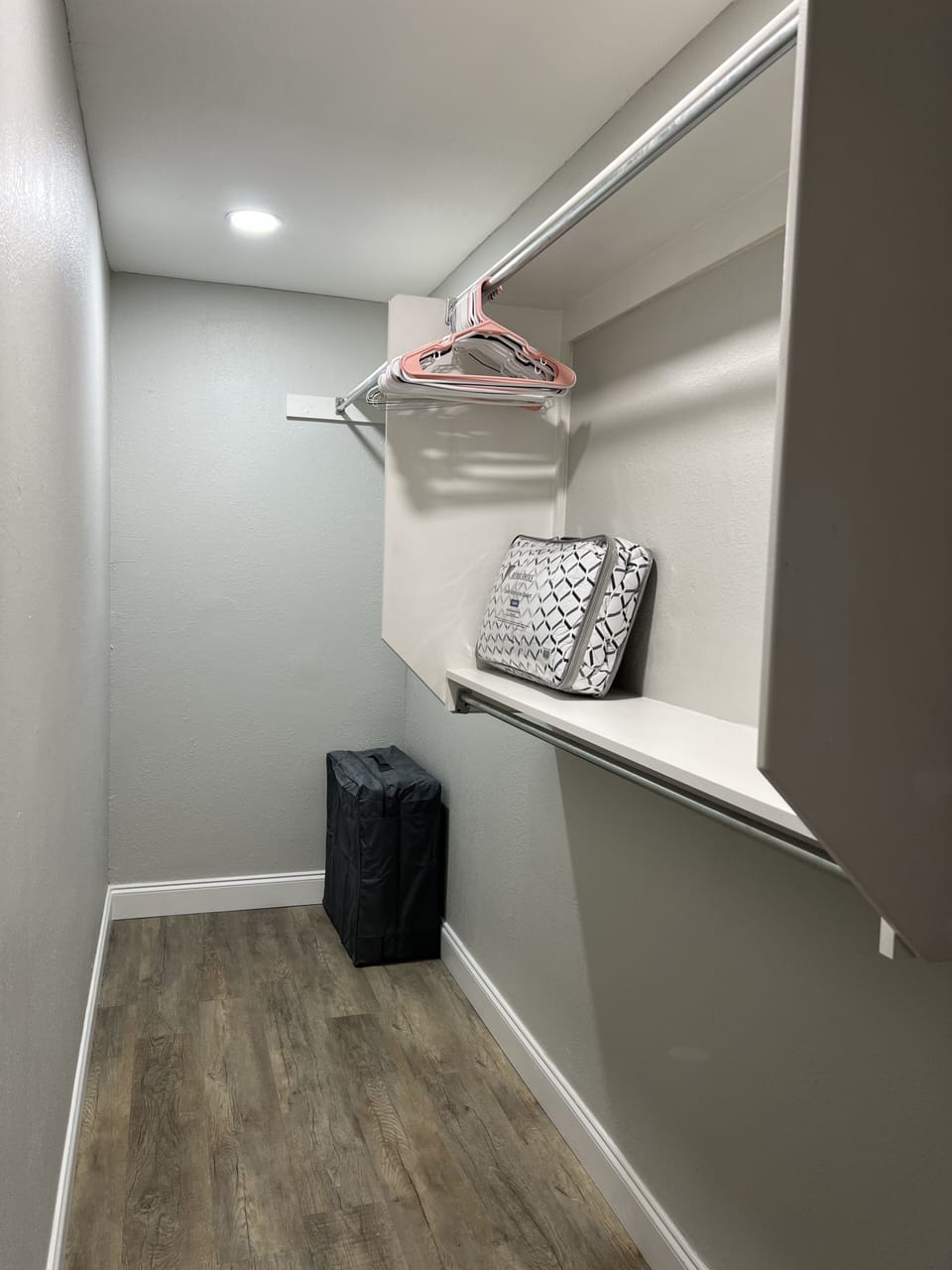 Bedroom 2 closet that leads to en suite bathroom with folding single mattress