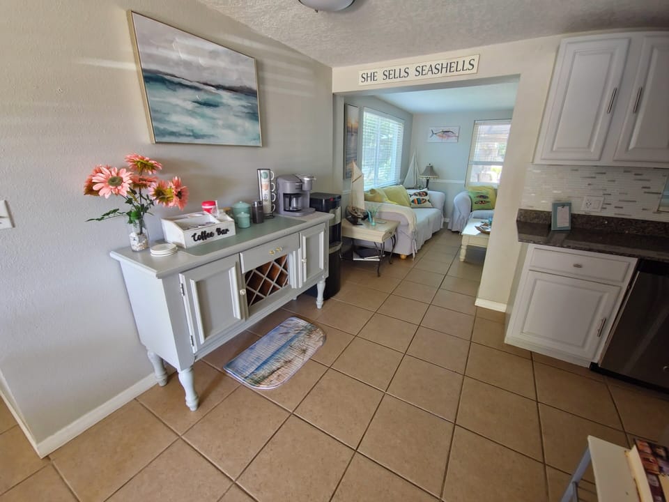 Kitchenette located to the side of the full kitchen.  Great coffee and tea bar