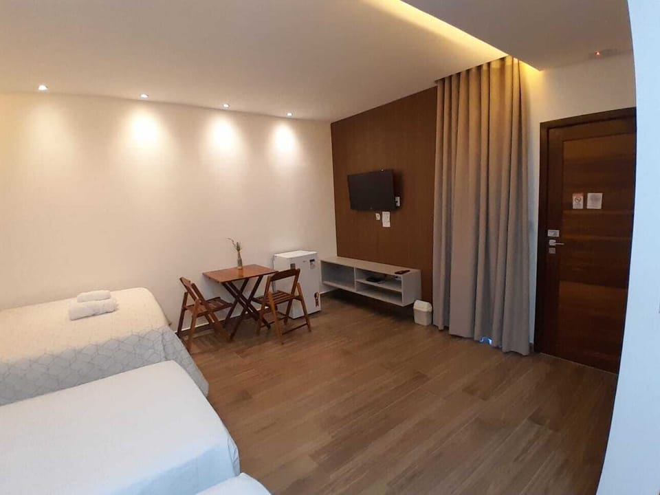 Panoramic Quadruple Room, 1 Bedroom, Non Smoking, Pool View | Premium bedding, Select Comfort beds, minibar, individually furnished