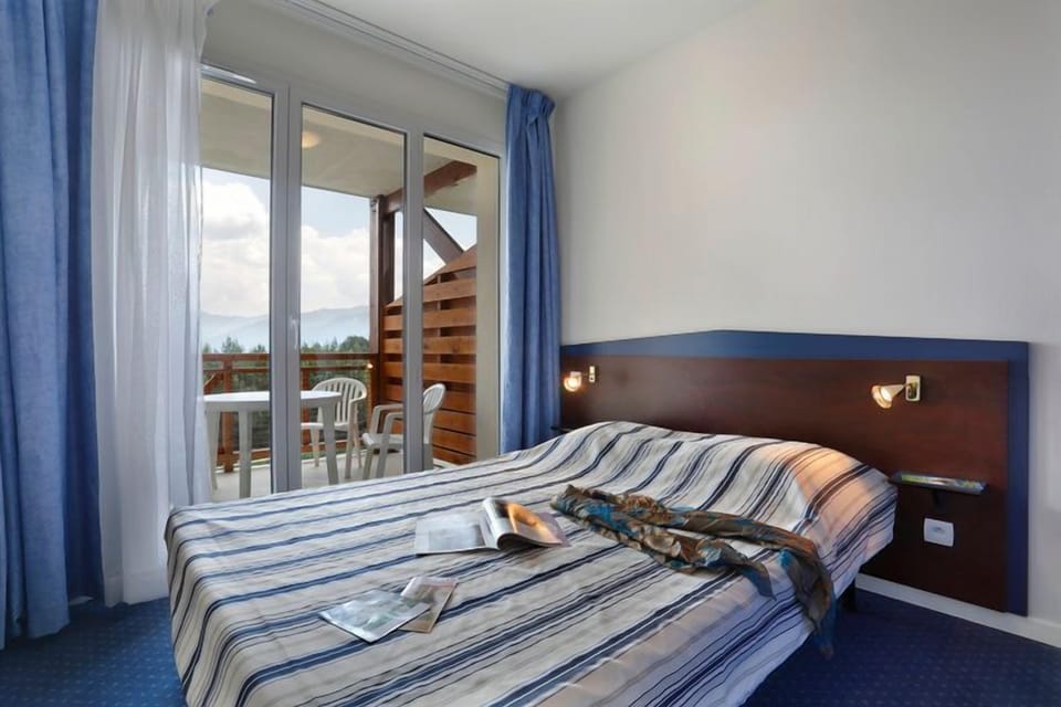 Relax on the comfy bed after a day outside.