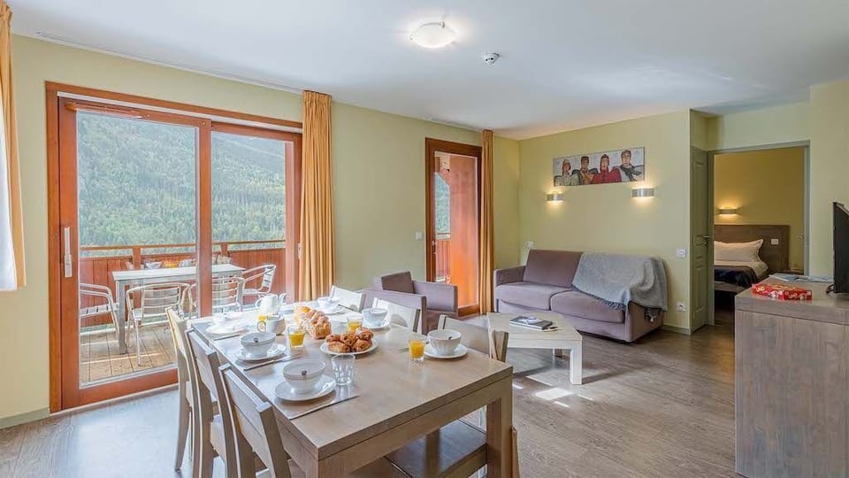 Enjoy a meal around the dining table.