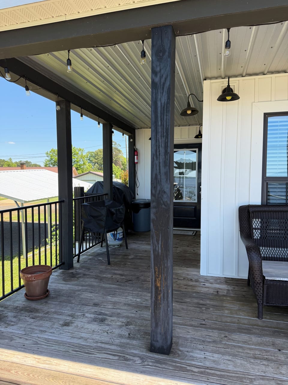 Back porch with outdoor stove and BBQ pit