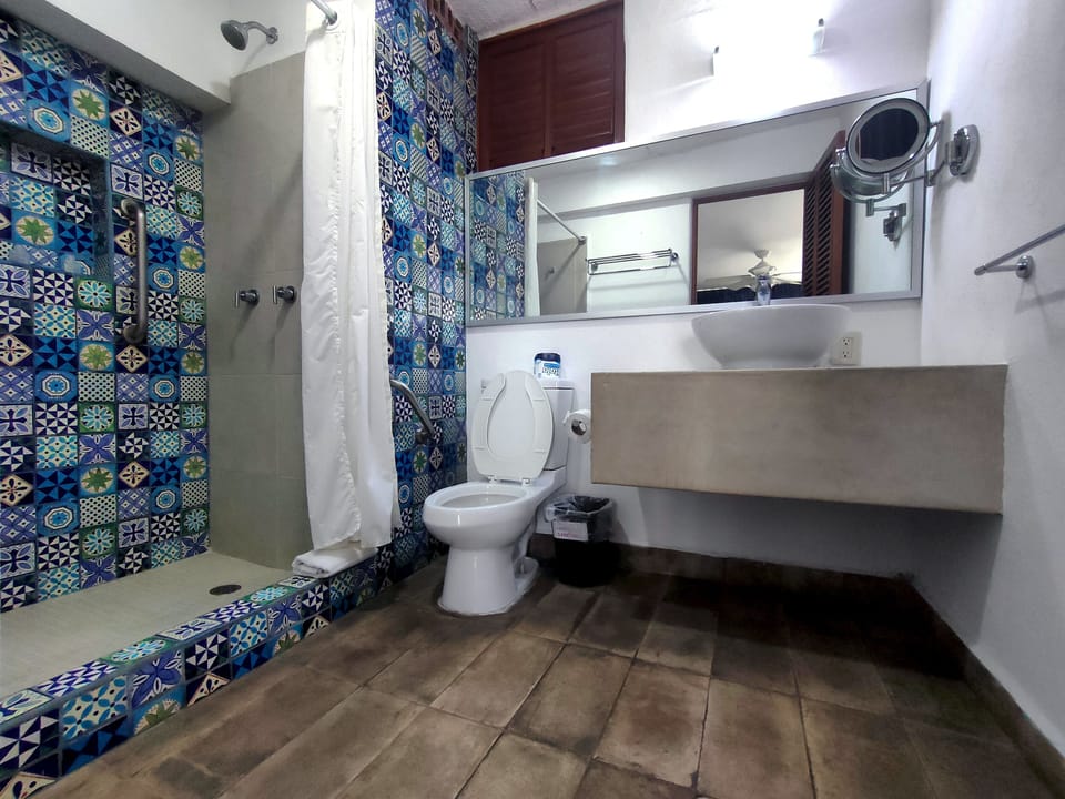 Standard Room, 2 Double Beds, Ocean View | Bathroom | Shower, free toiletries, towels, soap