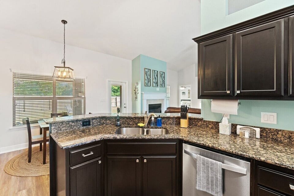 Fully stocked kitchen with stainless steel appliances