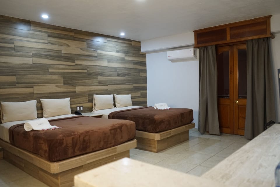 Standard Quadruple Room, 2 Double Beds | In-room safe, desk, iron/ironing board, free WiFi