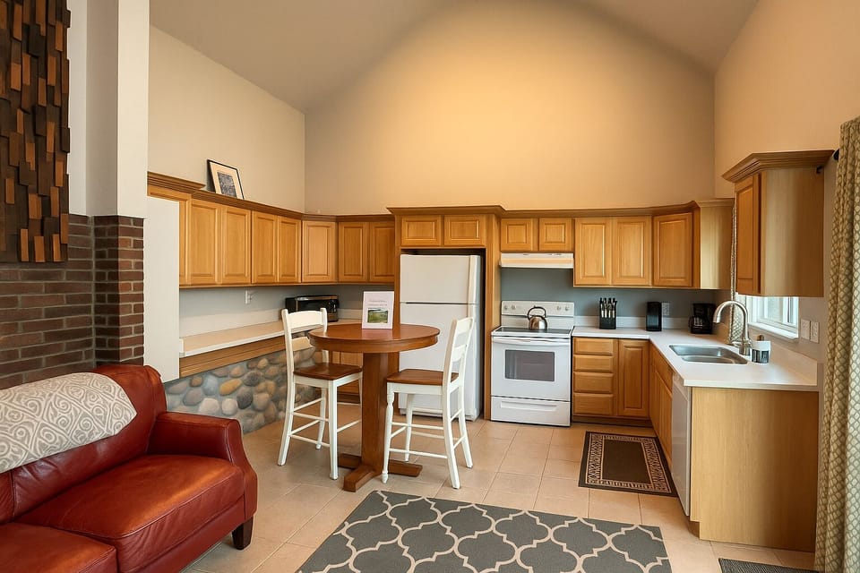The kitchen has a full size dishwasher, stove and refrigerator set up for your comfort and it also comes equipped with all of the basic needs for meal preparations .  