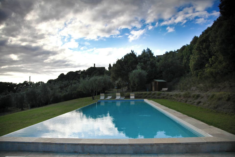 Seasonal outdoor pool, pool umbrellas, sun loungers