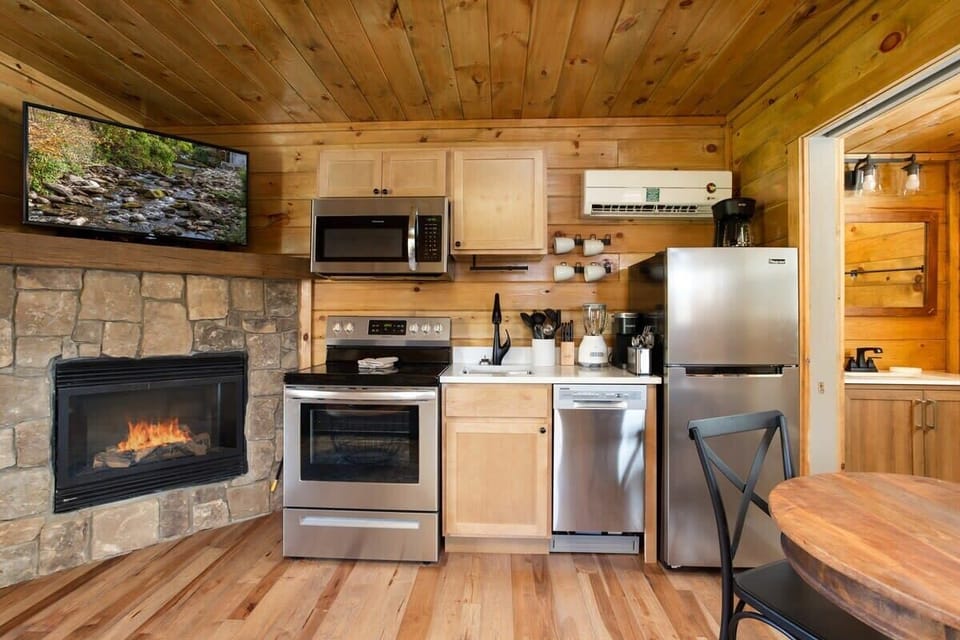 Gorgeous Kitchen Featuring Quartz Countertops And Stainless Steel Appliances!