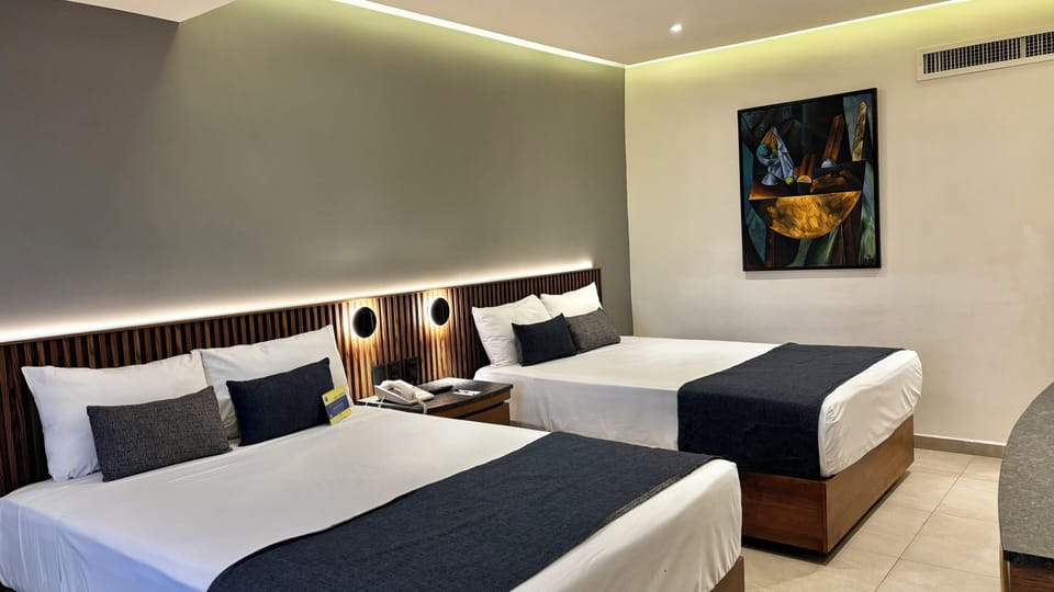 Hypo-allergenic bedding, desk, blackout drapes, soundproofing
