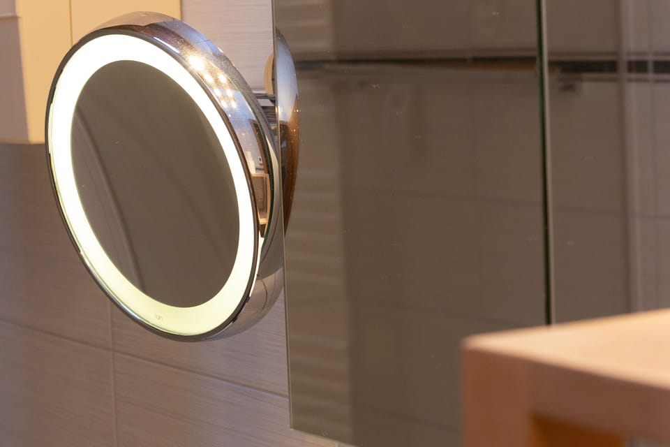 Three-Bedroom Attic Apartment | Bathroom | Designer toiletries, hair dryer, heated floors, towels